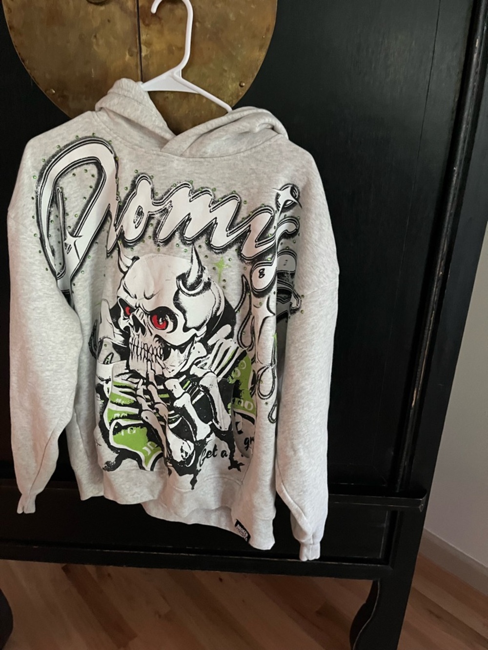 Broken promises “get a grip” studded hoodie